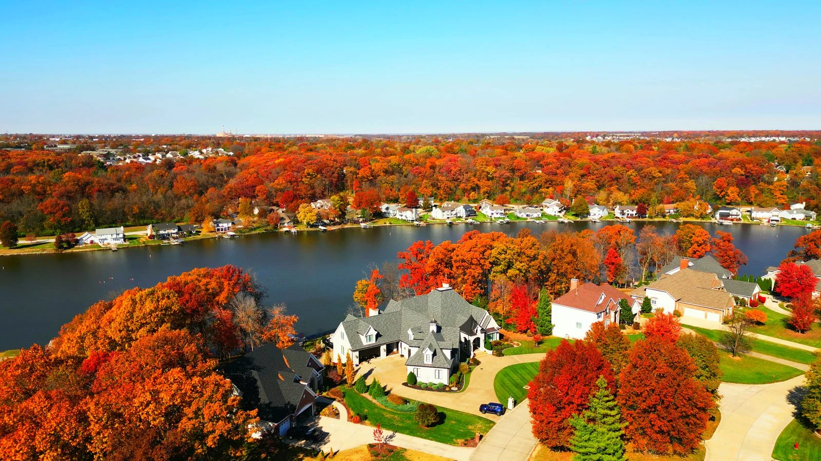 Autumn aerial of homes above the water in The Moorings Estates, Lake St. Louis, MO