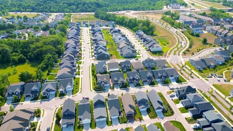 Aerial view of the Main Street Crossing townhomes beside Wildwood Town Center