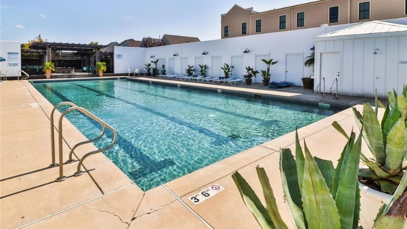 The Blue Agave pool at New Town, enclosed by its stucco walls