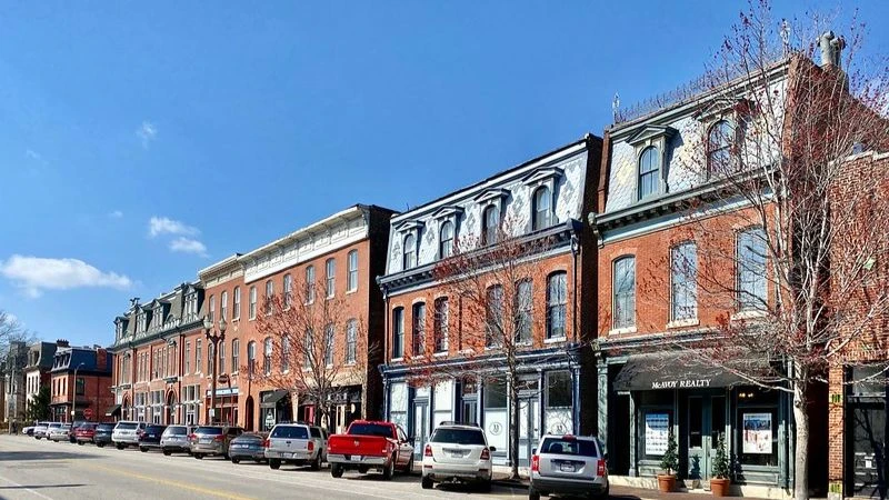 Storefronts and restaurants along a commercial block in Lafayette Square