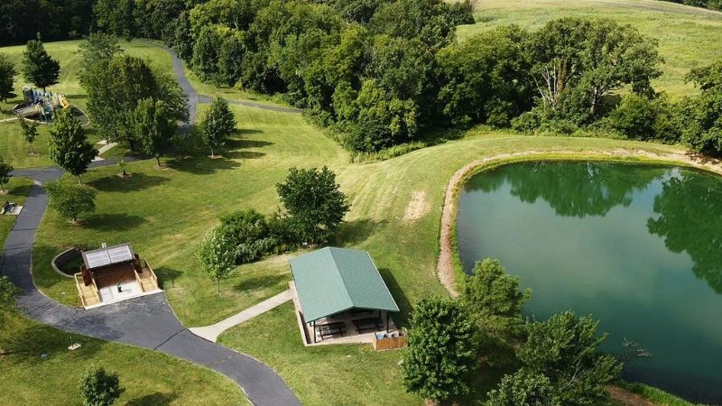 Aerial view of a pavilion and pond at Quail Ridge Park in Wentzville
