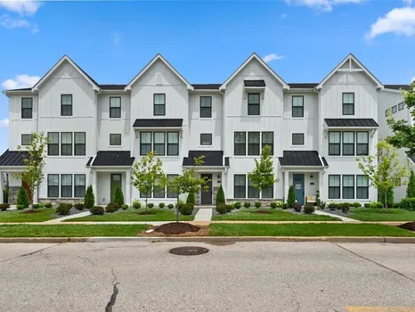 8933 Eager Road — modern white farmhouse-style townhomes