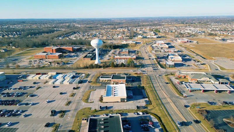 Aerial view of retail centers and the water tower along Wentzville Parkway