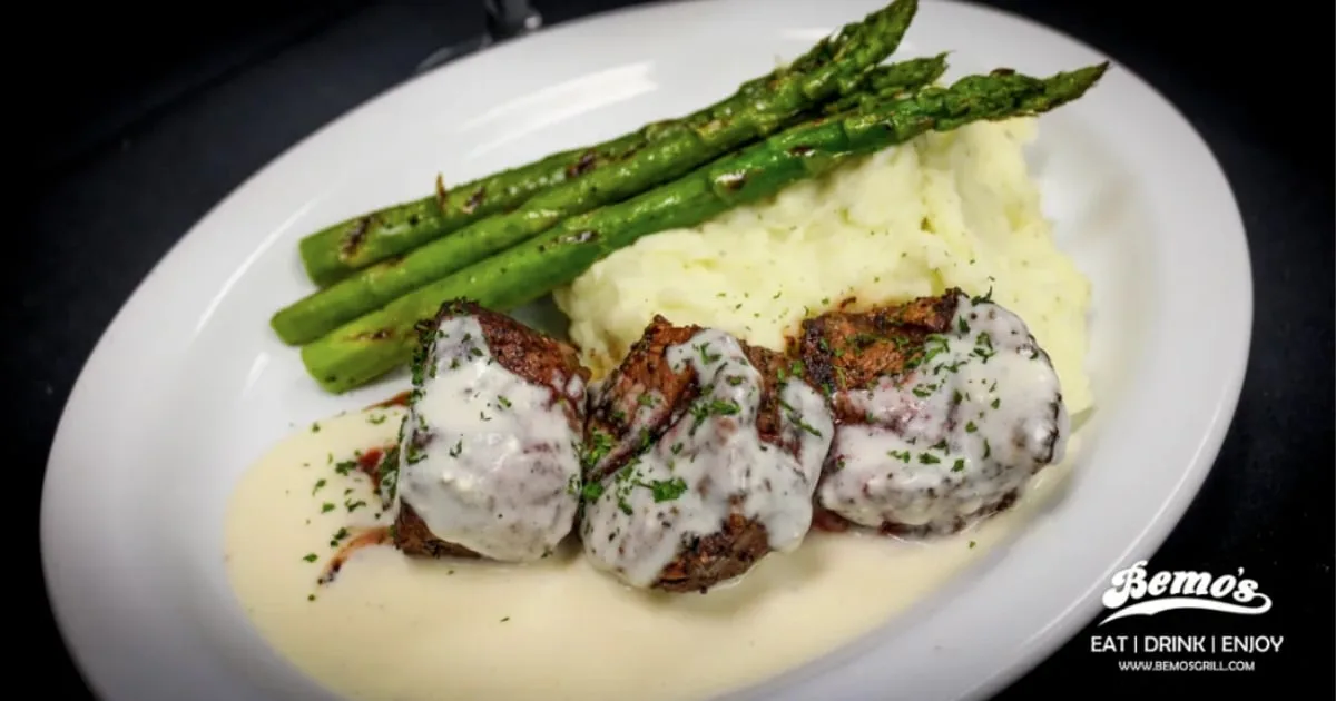 Plate of steak medallions with mashed potatoes and asparagus at Bemo's in Cottleville
