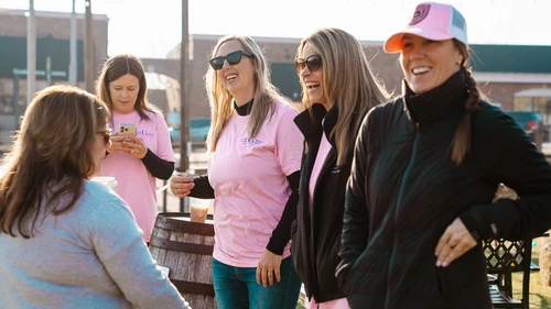 Gateway Realty Group team members laughing together at the Cottleville Easter Egg Hunt