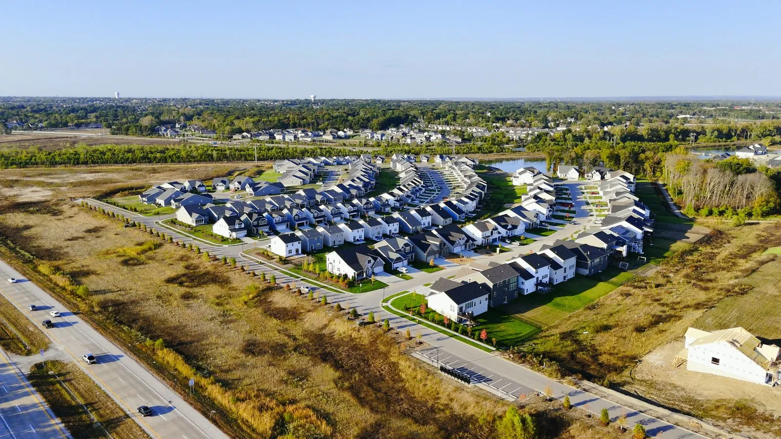 Aerial photograph of completed homes built by Consort Homes and Fischer & Frichtel at Cottleville Trails, seen from above with the surrounding streets