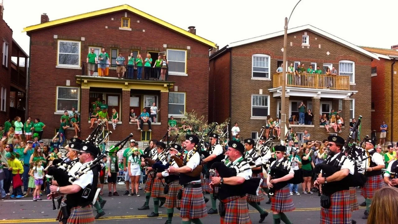 Crowds and a bagpipe band at the St. Patrick's Day parade in Dogtown, St. Louis