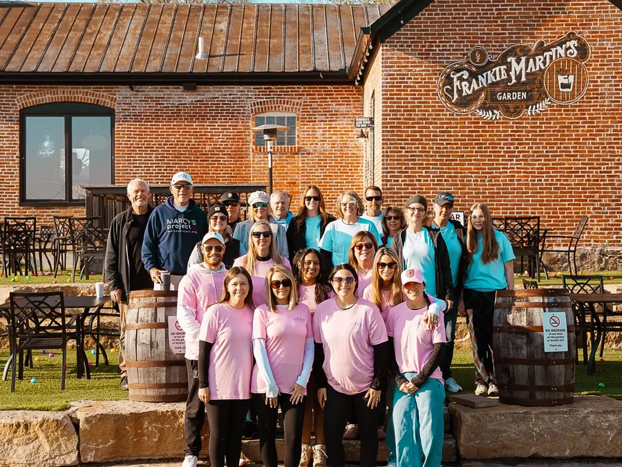 Gateway Realty Group volunteer team outside Frankie Martin's Garden at the Cottleville Easter Egg Hunt
