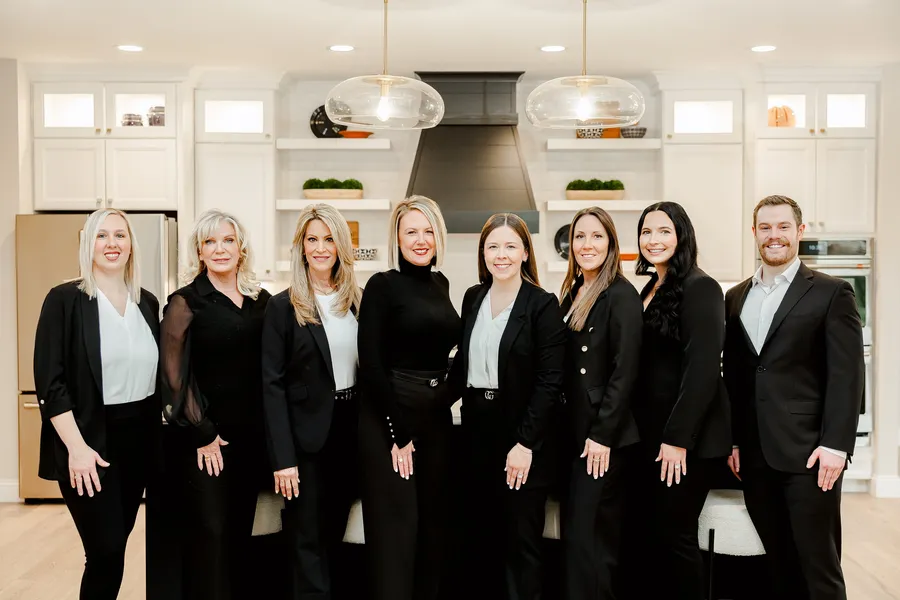 Gateway Realty Group team in a client's kitchen