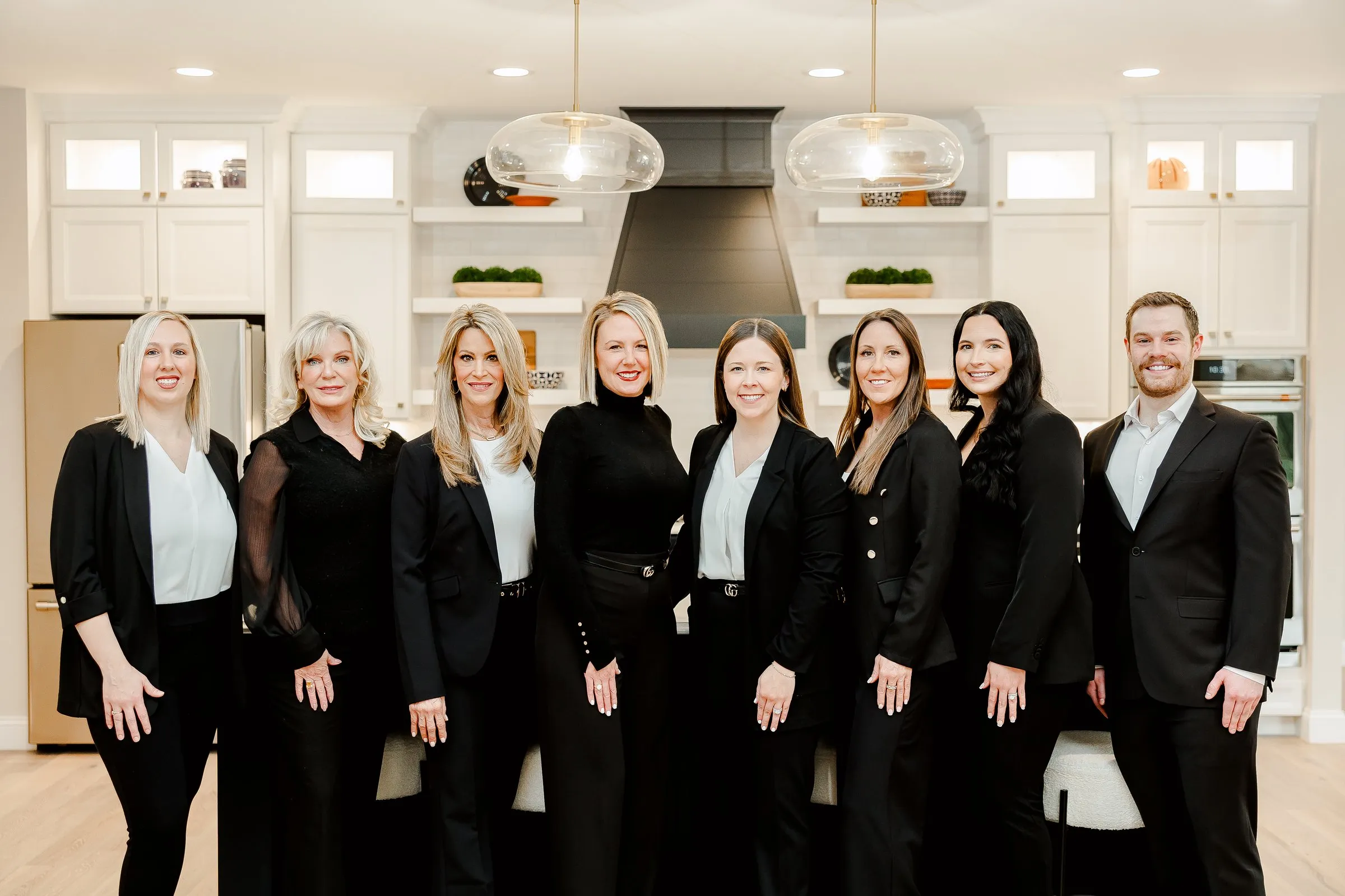 Gateway Realty Group gathered in a kitchen