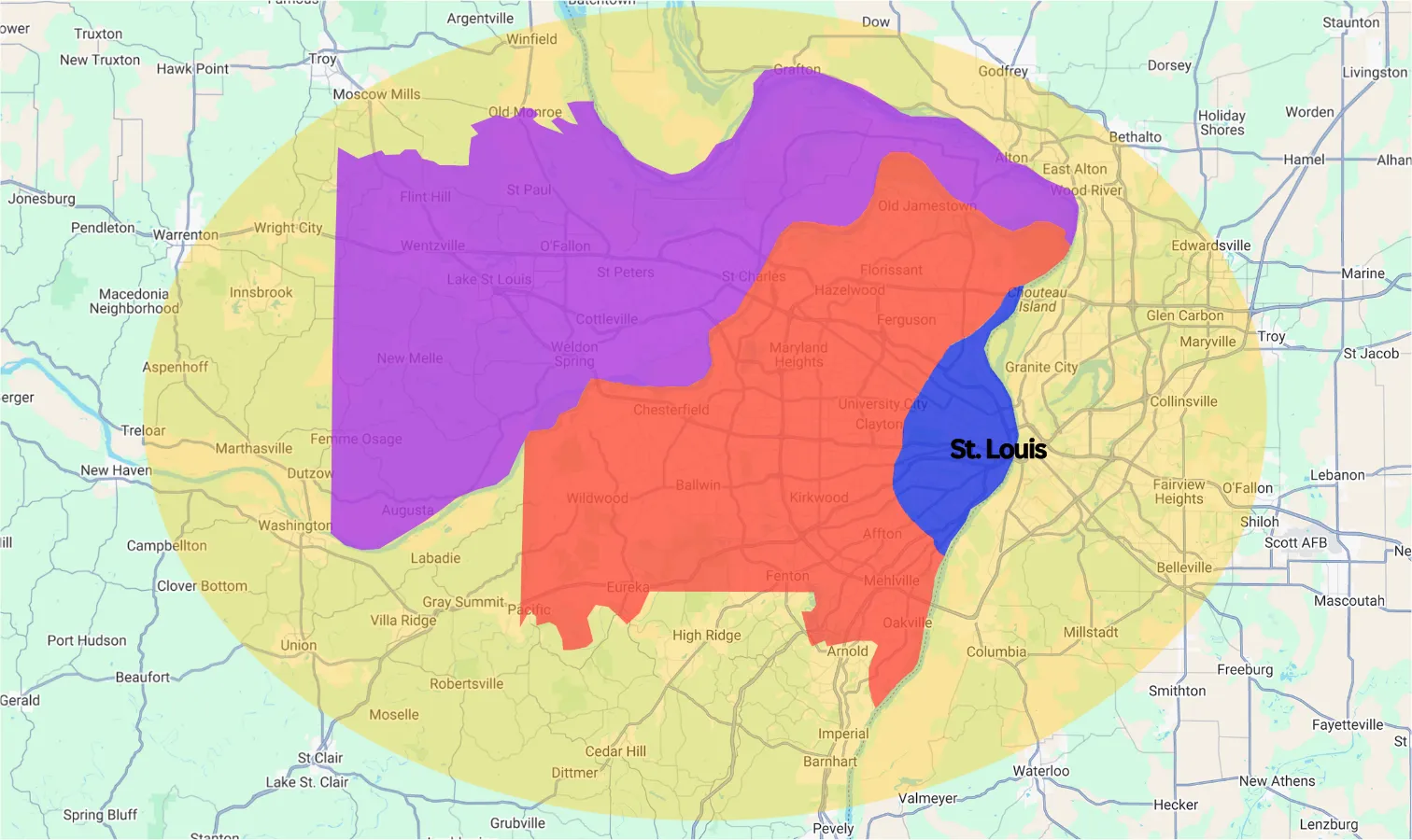 Map of the greater St. Louis region: St. Charles County north-west across the Missouri River, St. Louis County wrapping the centre, and the City of St. Louis as a separate area on the Mississippi, inside the wider metro that reaches into Illinois