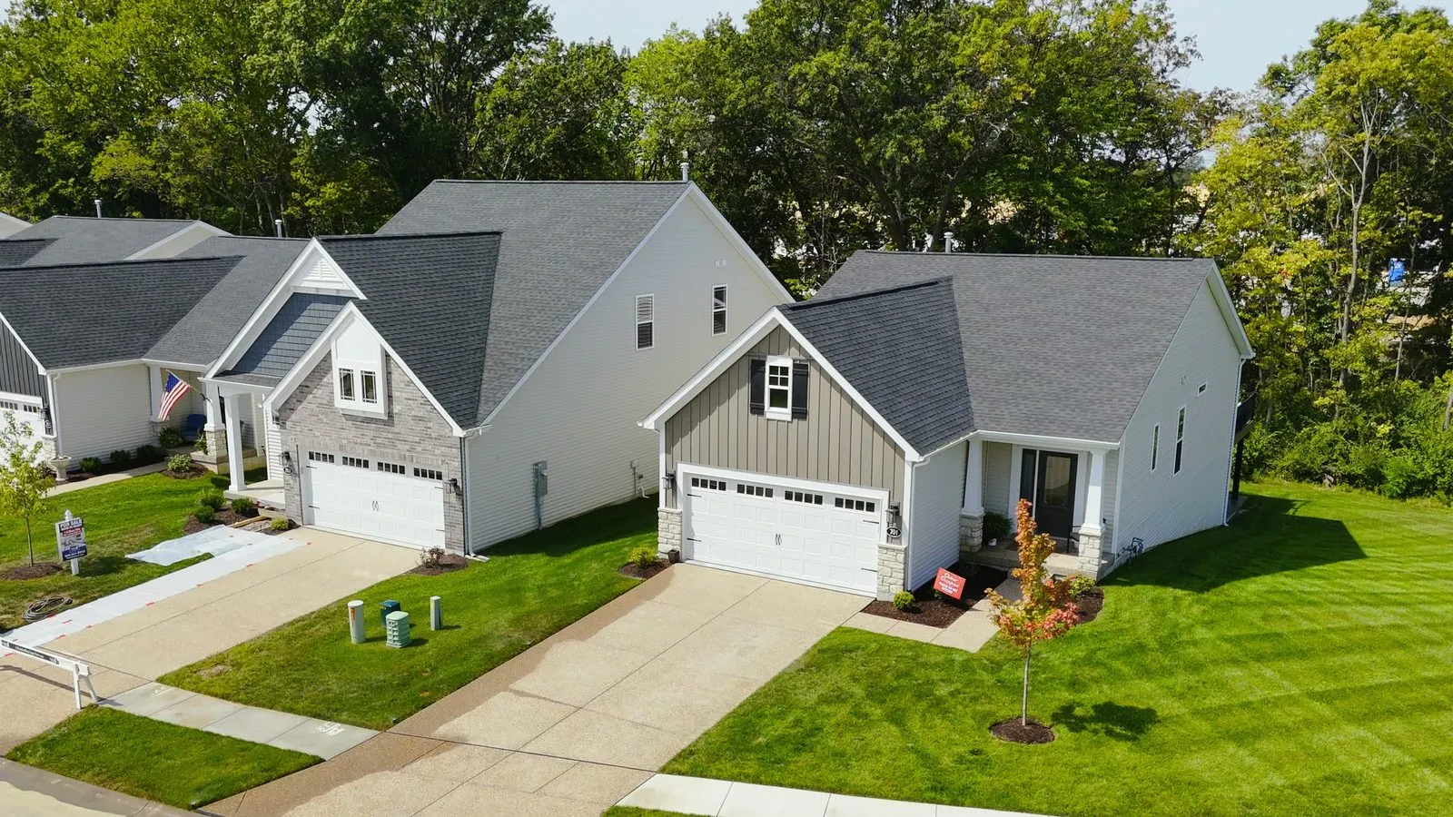 Completed free-standing villas at Harvest in August 2025, single level and story-and-a-half homes on smaller lots with mature landscaping going in