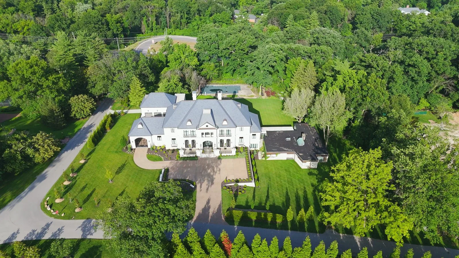 A large estate on acreage in the Huntleigh Woods subdivision