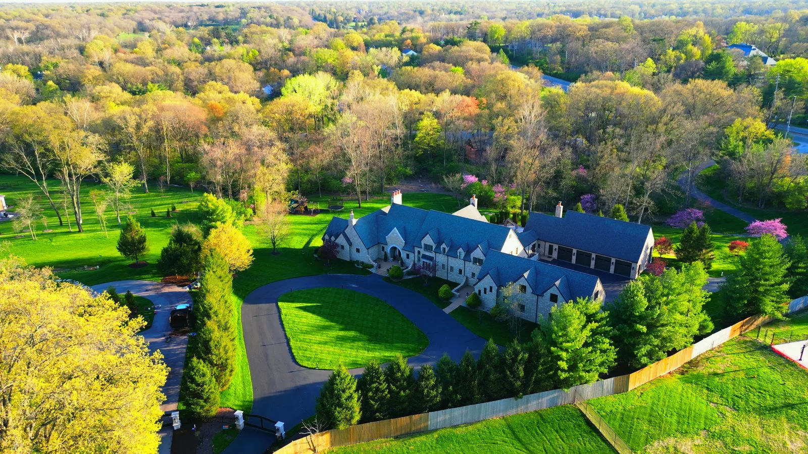 Aerial view of a large custom mansion off Litzsinger Road in Ladue, Missouri