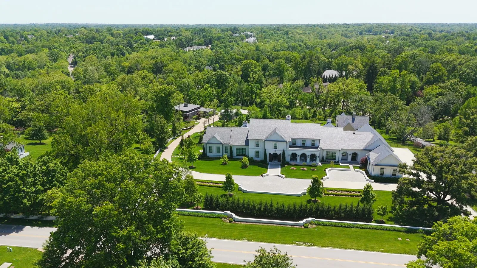 Aerial view of a newer built mansion on Litzsinger Road in Ladue, Missouri