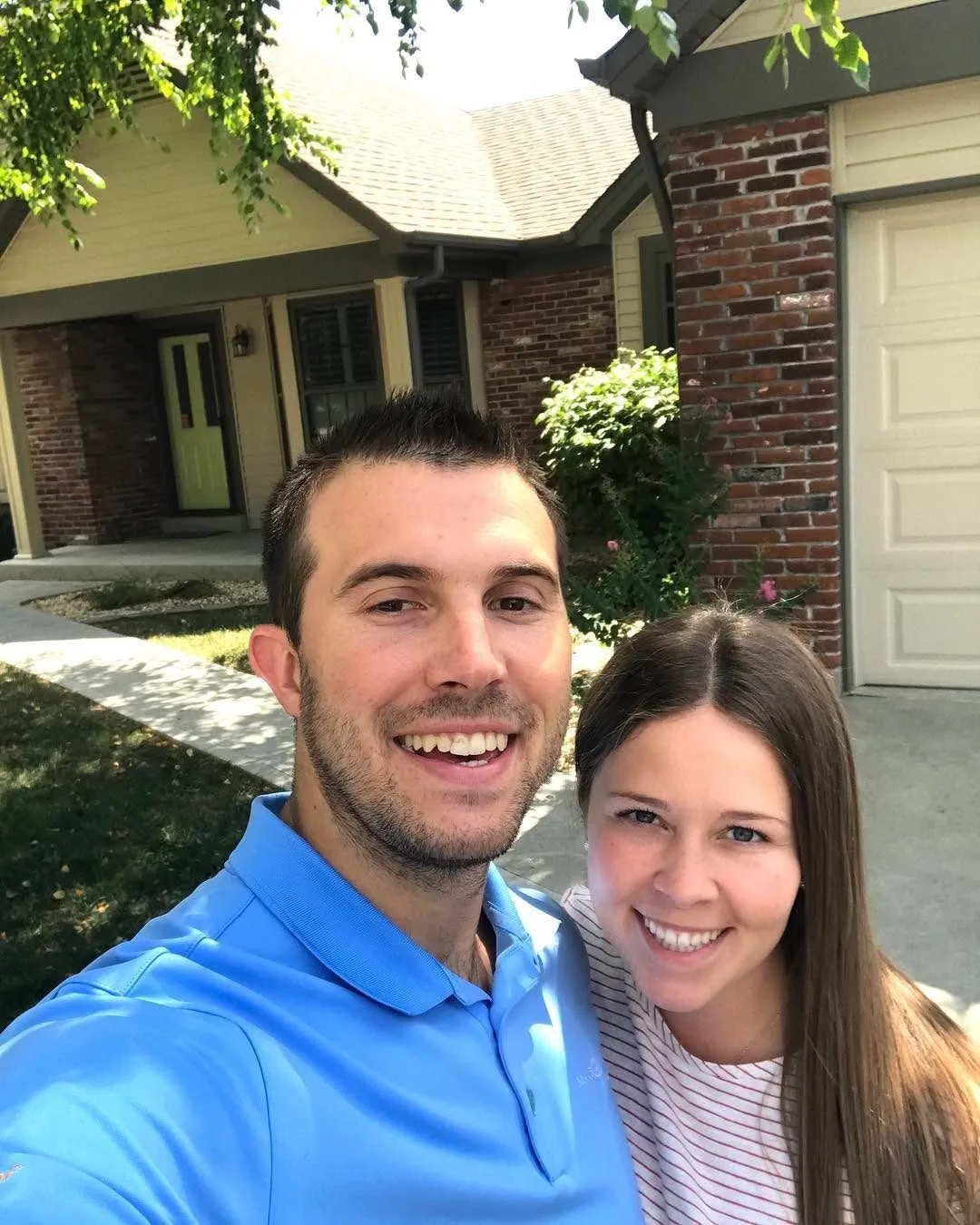 Madison Hayes and her husband the day they bought their first house together in 2018