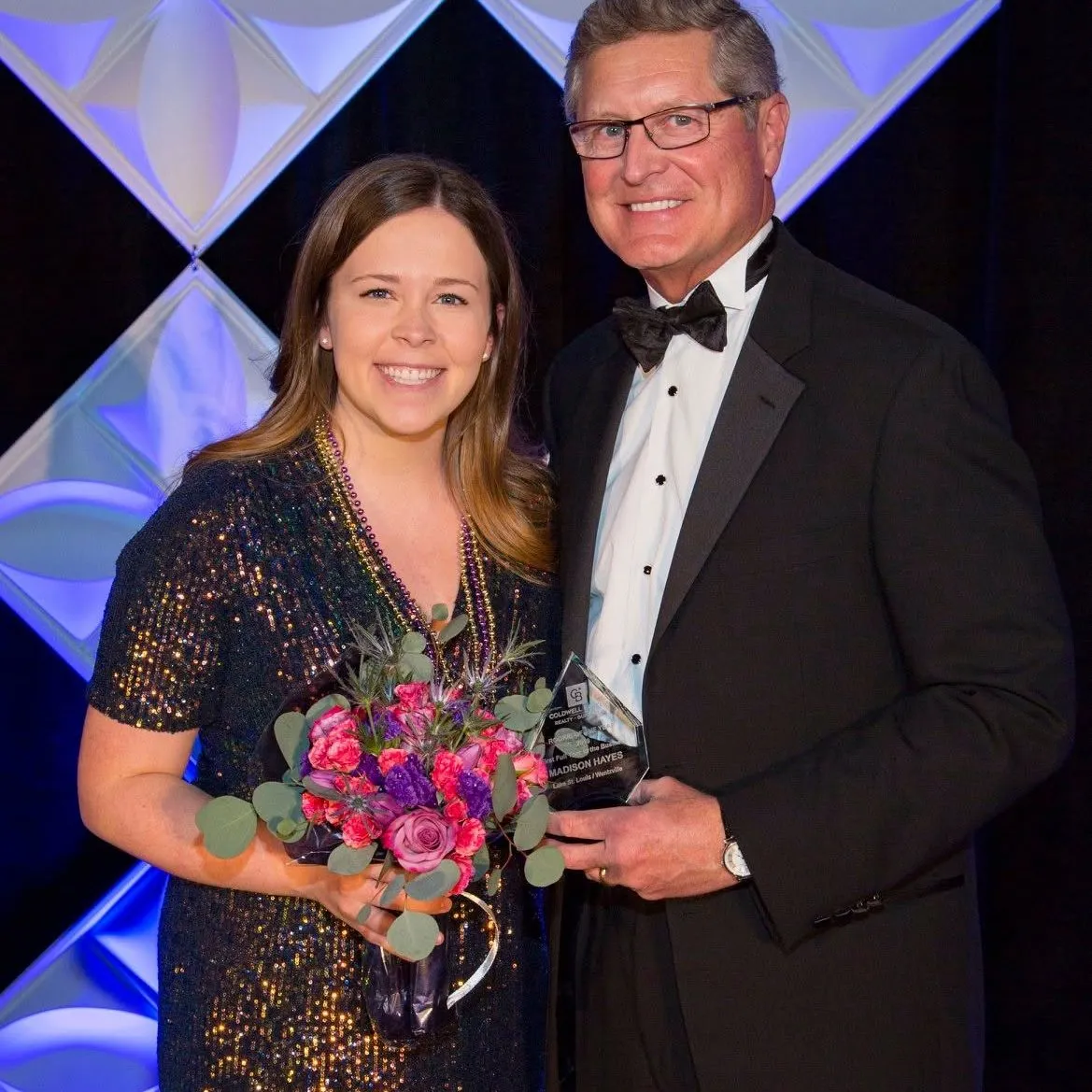 Madison Hayes receiving her 2019 Rookie of the Year award at the Coldwell Banker Gundaker awards gala in St. Louis