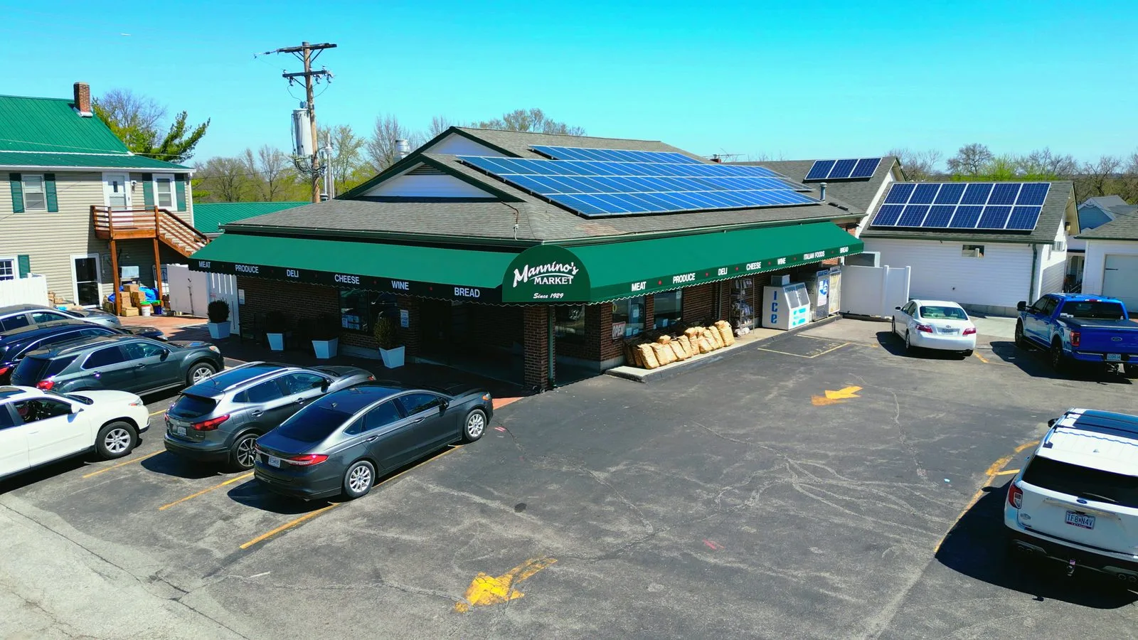 Aerial view of Mannino's Market on Highway N in Cottleville, with its green roof and solar panels