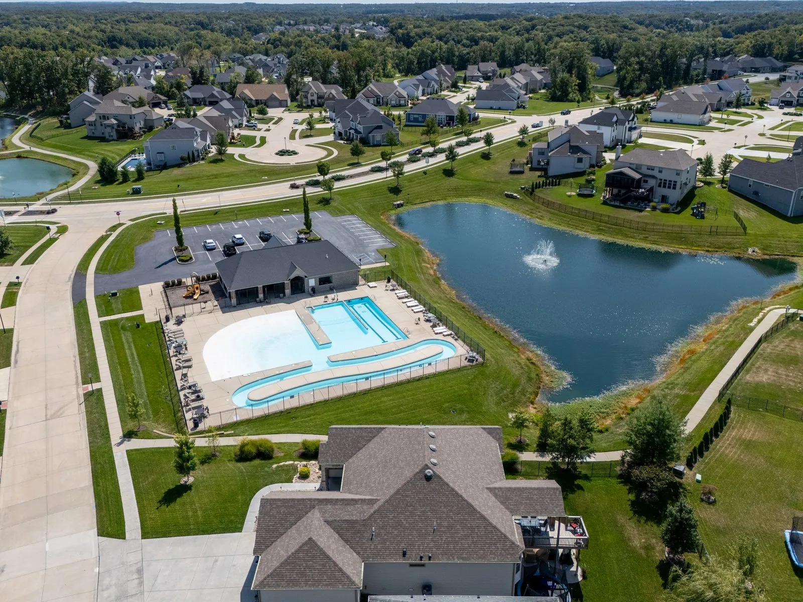 Drone photo of the Shady Creek neighborhood pool and lake in O'Fallon, Missouri