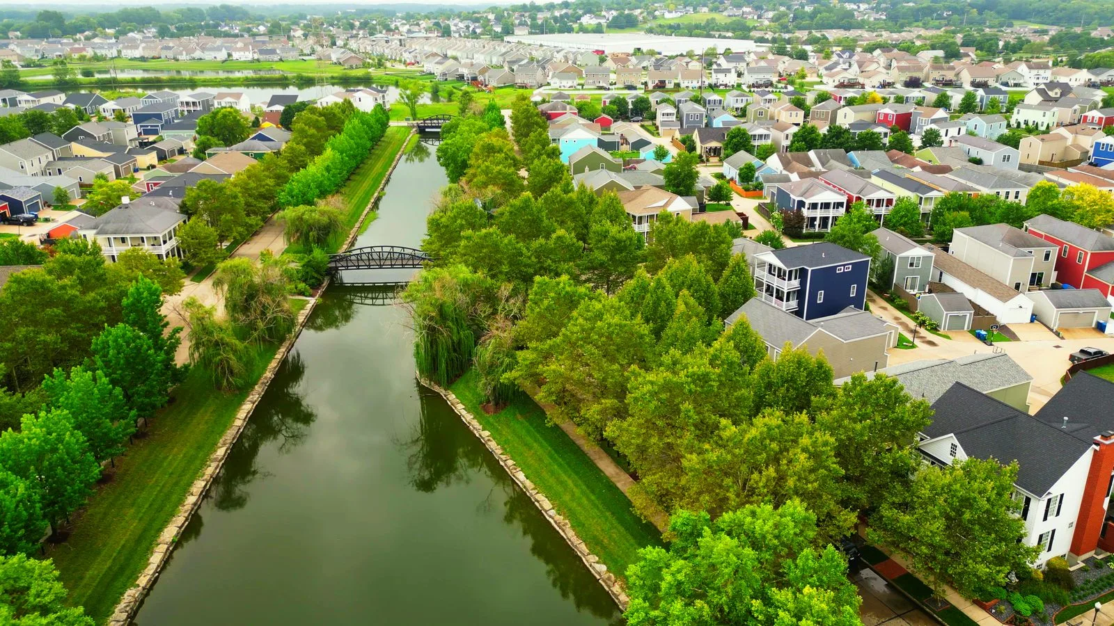 One of New Town's lakes with homes along the waterfront