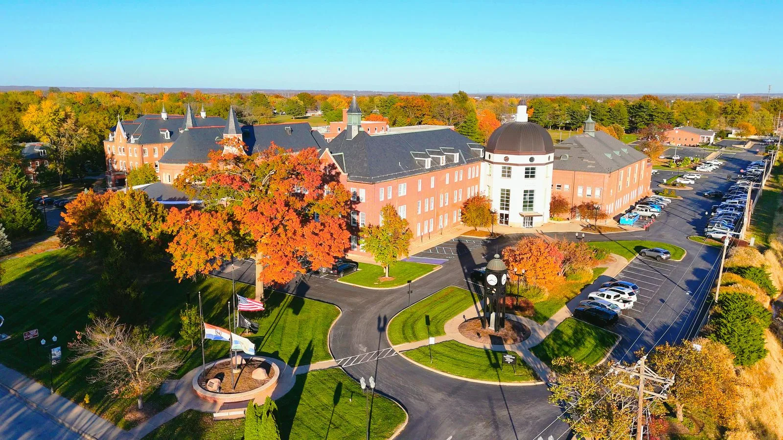 Aerial view of O'Fallon, Missouri City Hall, its domed entrance and clock tower in autumn