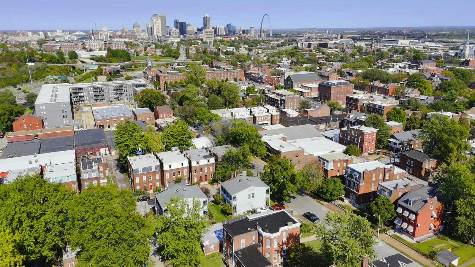 Aerial view over Soulard toward downtown St. Louis and the Gateway Arch