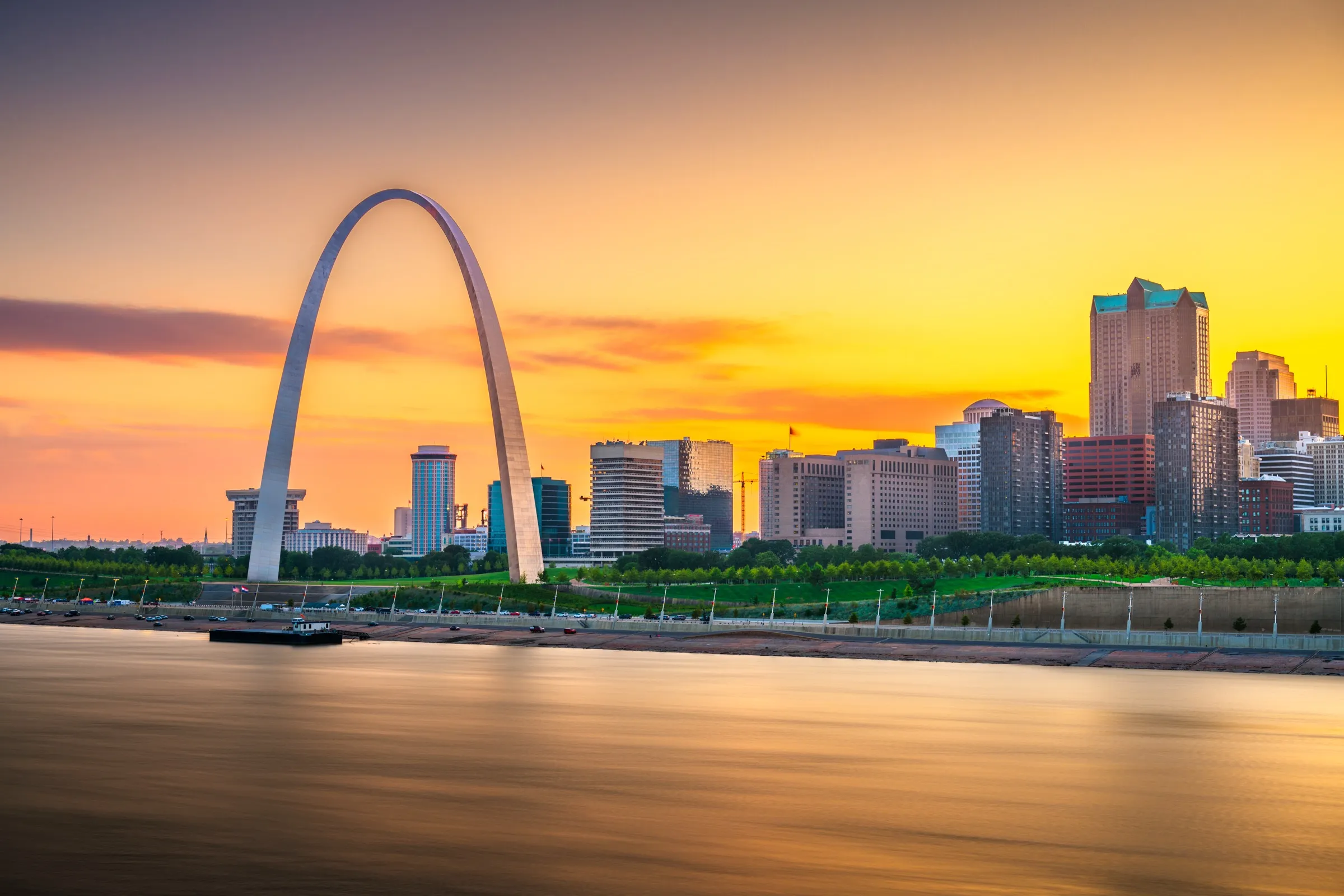 The St. Louis skyline and Gateway Arch at sunset