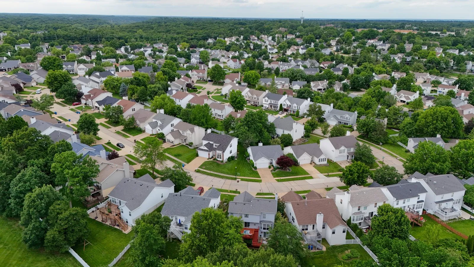 Aerial view of an established subdivision of two-story homes in Wildwood, Missouri