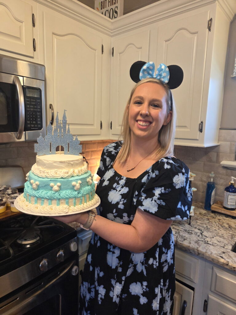 Kate with mickey mouse cake
